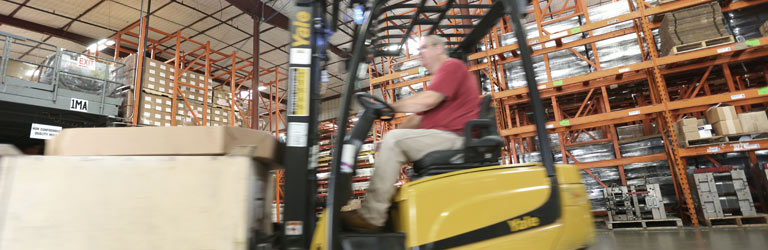 Forklift in warehouse