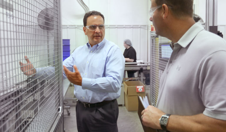 Leadership discussing cost reduction on the shopfloor